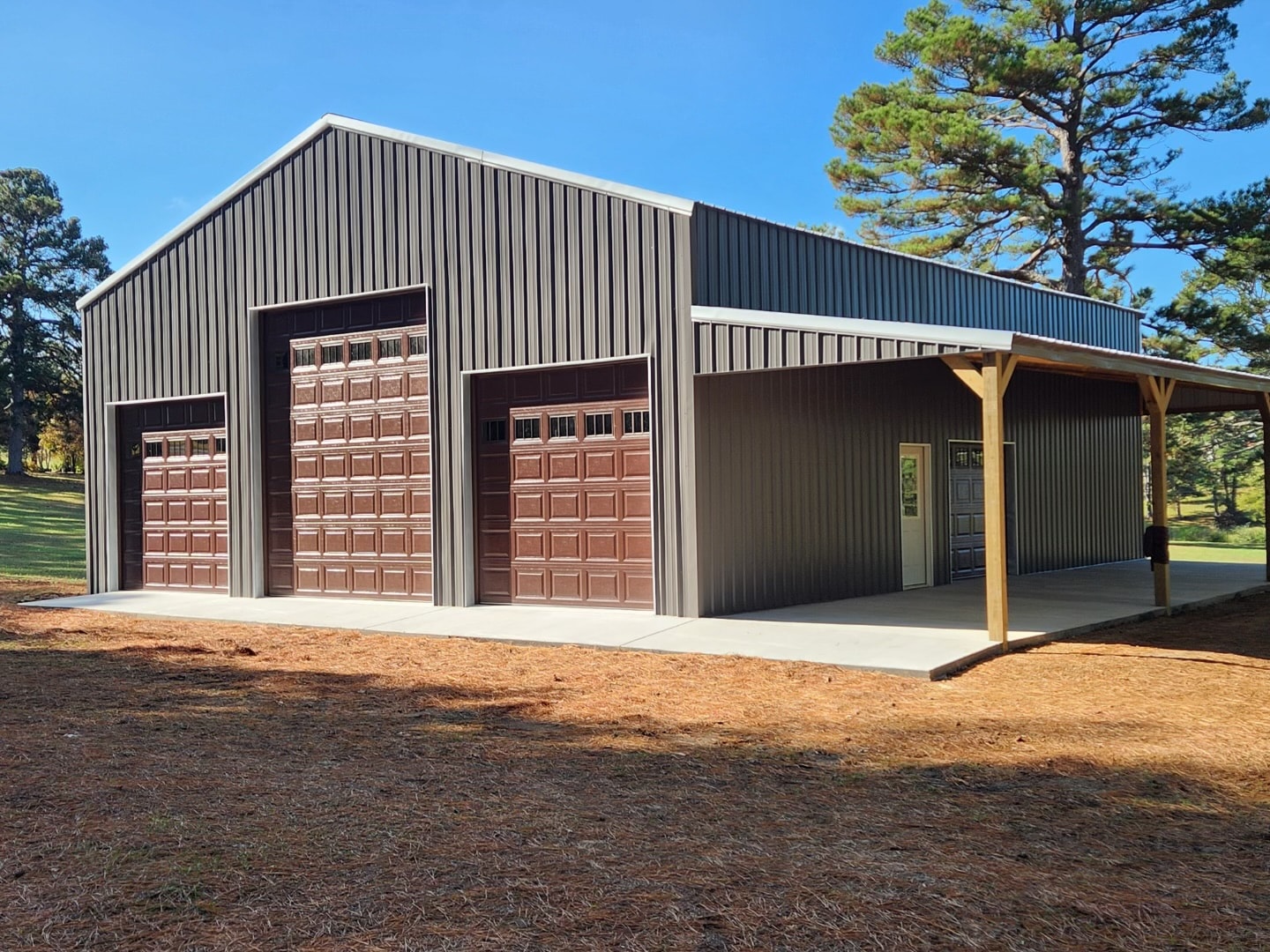 Metal garage with two white doors