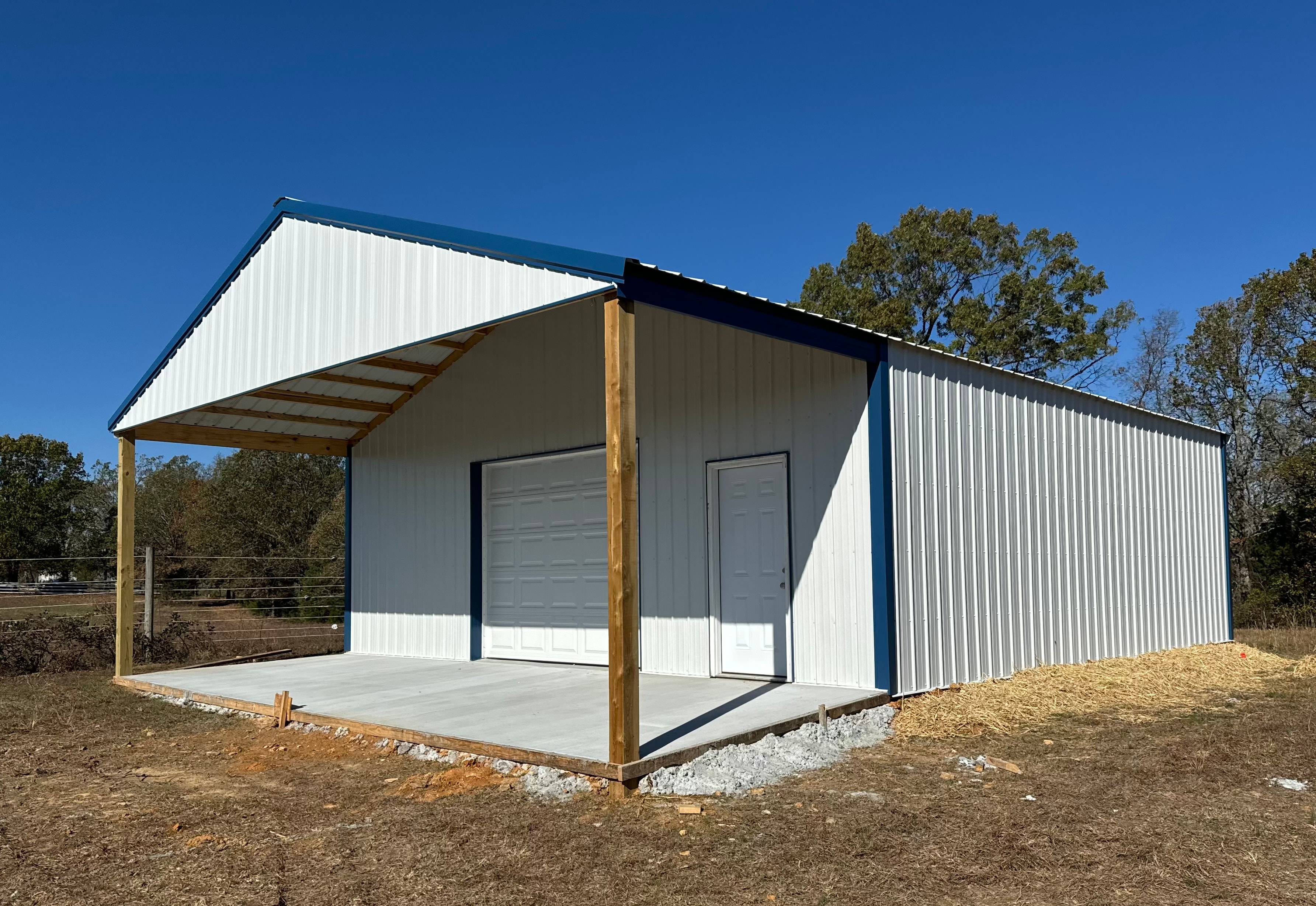 Quality Barns & More new garage build with metal roof