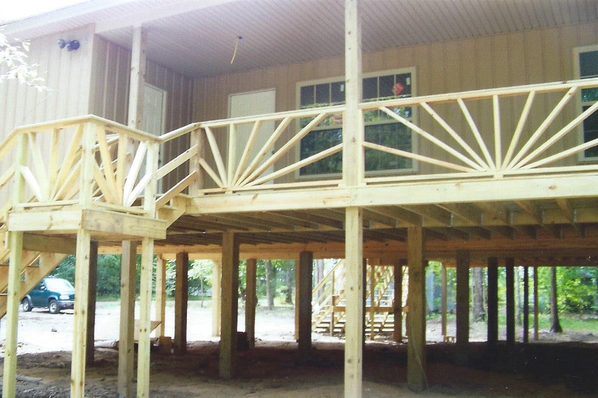 Quality Barns & More river house exterior
