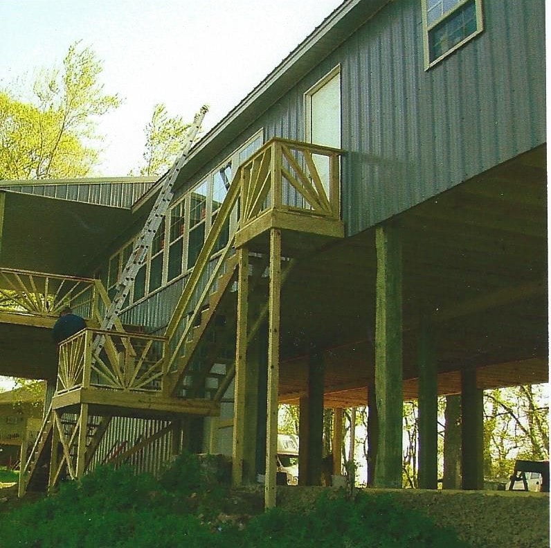 Quality Barns & More river house construction